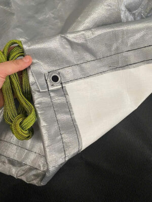 Bạt trắng xám nhũ bạc may viền đóng khuy