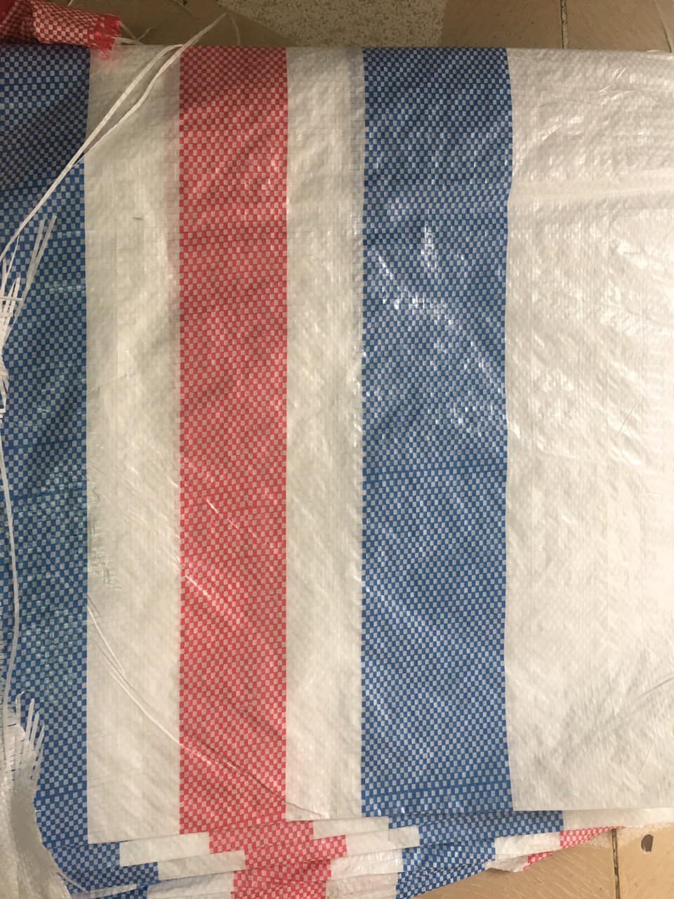 Bạt dứa che phủ công trình xây dựng Bạt dứa che phủ công trình xây dựng